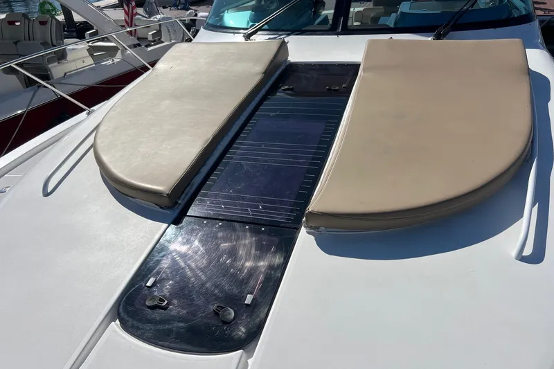 Slide: The Image of 2014 Tiara Yachts 3900 Coronet deck with beige cushions and solar panel. - 25