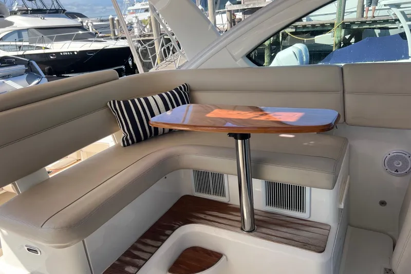 Slide: The Image of Luxurious interior of 2014 Tiara Yachts 3900 Coronet with elegant seating and table. - 27