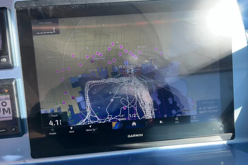 Slide: The Image of Garmin navigation display on 2014 Tiara Yachts 3900 Coronet, showing nautical chart and GPS data. - 31