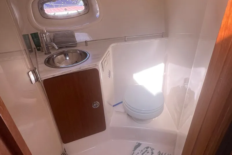 Slide: The Image of Bathroom interior of 2014 Tiara Yachts 3900 Coronet with sink and toilet. - 37