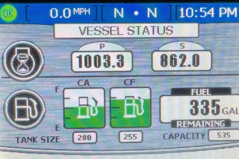 Slide: The Image of Vessel status display of 2014 Tiara Yachts 3900 Coronet, showing fuel levels and engine hours. - 58