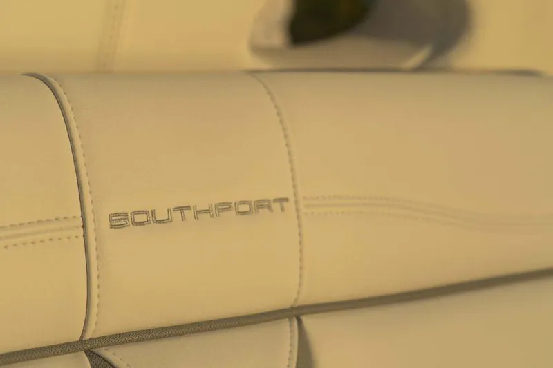 Slide: The Image of Close-up of 2026 Southport 33 FE boat seat with logo stitching. - 18