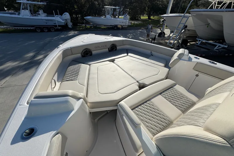 Slide: The Image of 2026 Solace 28 HCS boat interior with luxurious seating and modern design. - 21