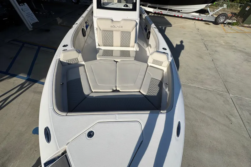 Slide: The Image of 2026 Solace 28 HCS boat with spacious seating and modern design. - 22