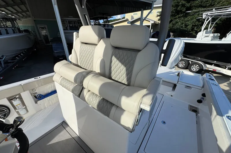 Slide: The Image of Luxurious seating on 2026 Solace 28 HCS boat, featuring elegant upholstery and modern design. - 31