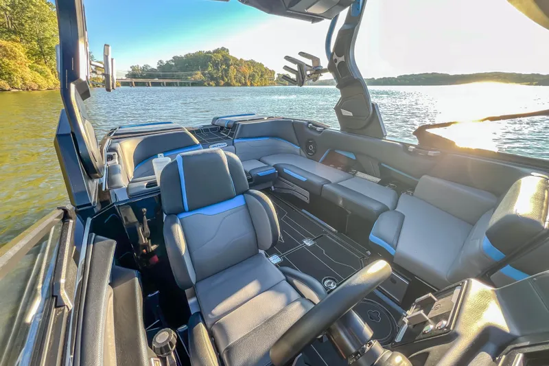 Slide: The Image of Luxurious interior of 2024 Supra SV 400 boat on a sunny lake. - 14
