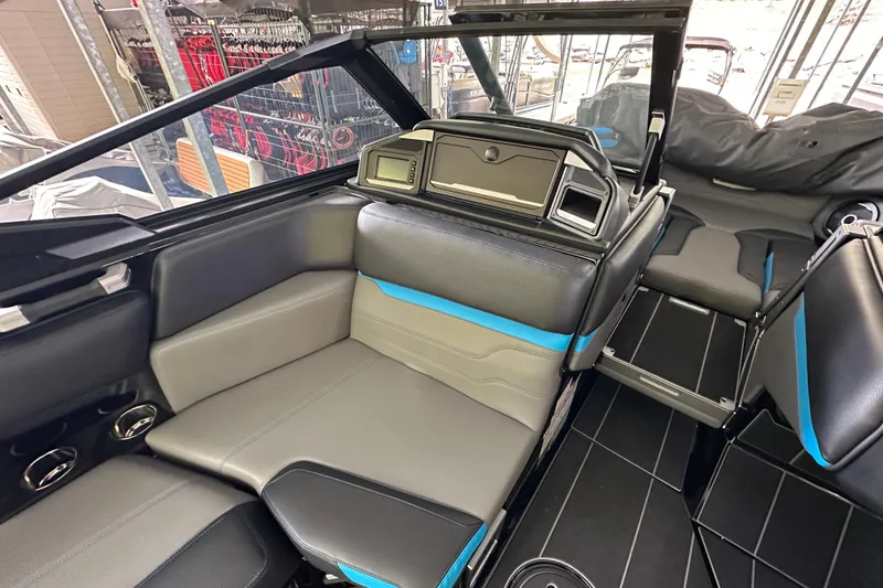 Slide: The Image of 2024 Supra SV 400 boat cruising on open water, showcasing sleek design and powerful performance. - 5