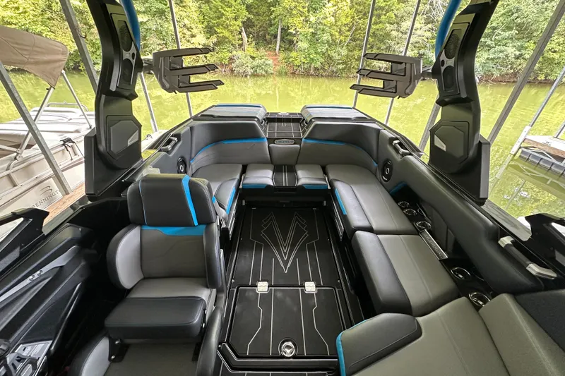 Slide: The Image of Aerial view of 2024 Supra SV 400 boat cruising on water. - 7