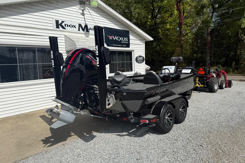 Slide: The Image of 2022 Vexus AVX1980 boat parked outside Knox Marine dealership. - 11
