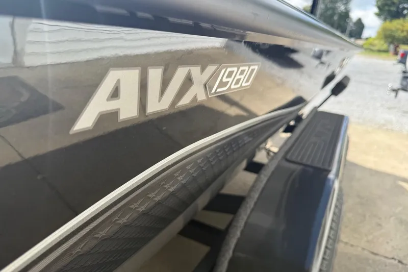 Slide: The Image of 2022 Vexus AVX1980 boat side view with model name visible. - 15