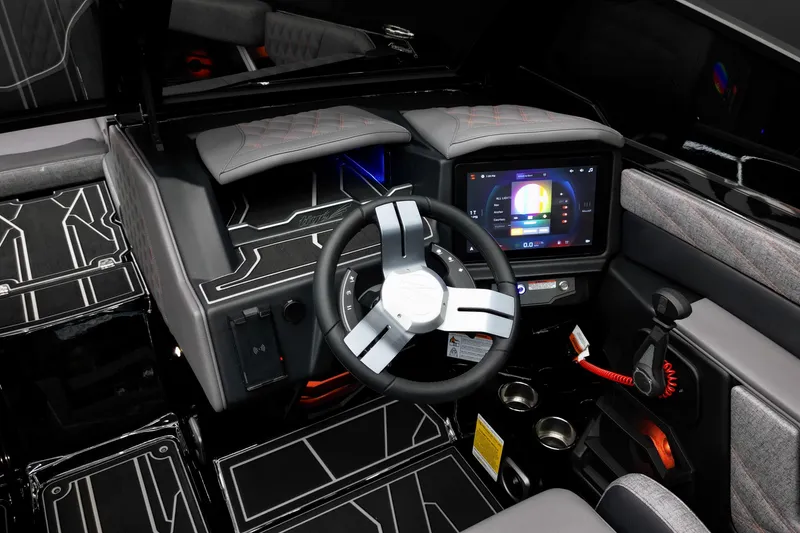 Slide: The Image of 2026 Tigé 22RZX boat interior with modern dashboard and touchscreen controls. - 18