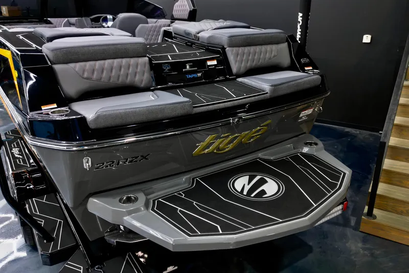 Slide: The Image of 2026 Tigé 22RZX boat with sleek design and comfortable seating. - 21