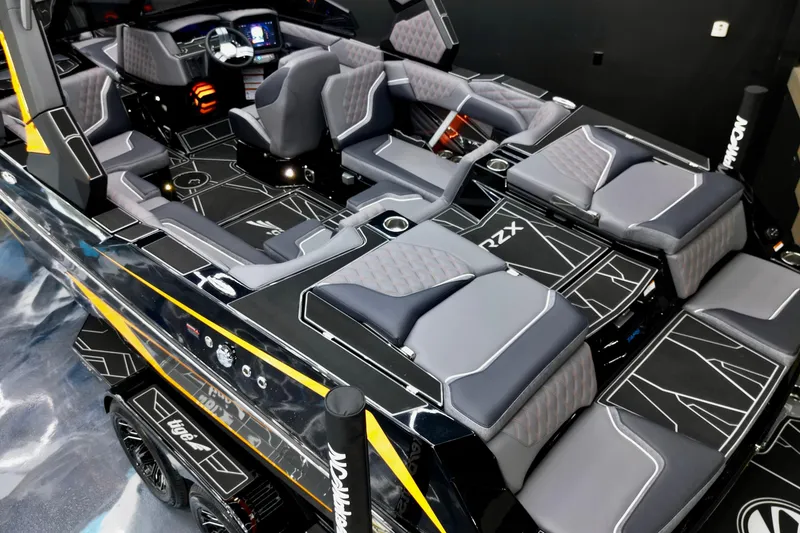 Slide: The Image of Luxurious interior of 2026 Tigé 22RZX boat with modern seating and sleek design. - 22