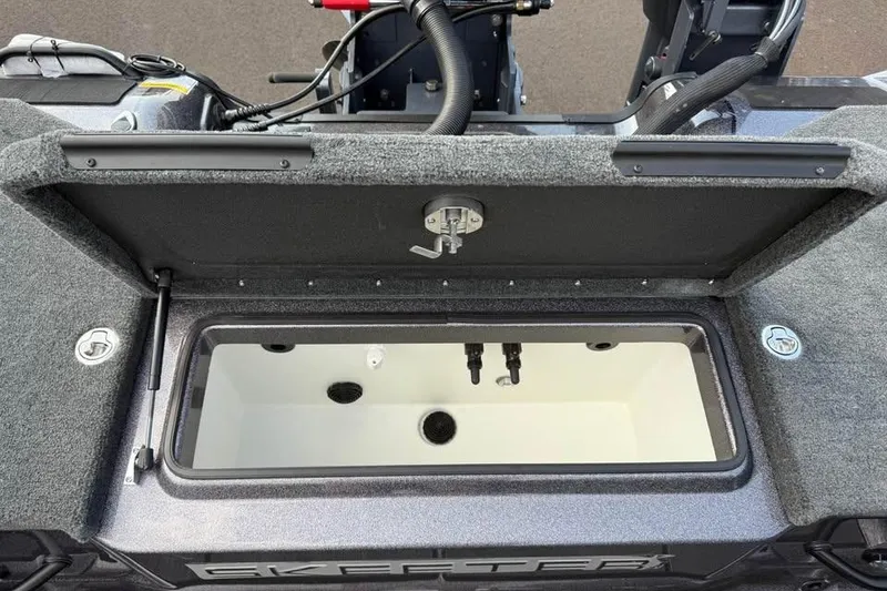 Slide: The Image of 2026 Skeeter WXR2060 boat livewell with open lid and interior view. - 10