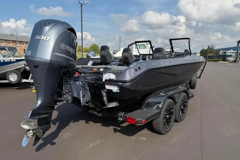 Slide: The Image of 2026 Skeeter WXR2060 boat with Yamaha 300 engine on a trailer. - 3