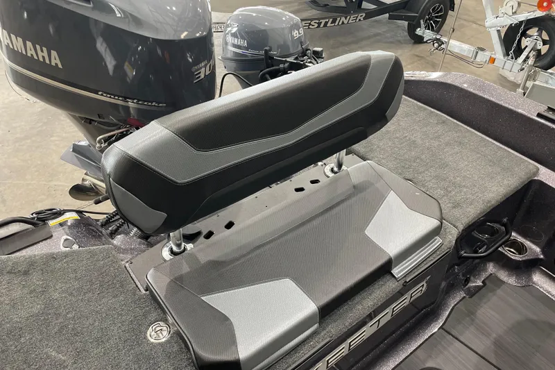 Slide: The Image of Skeeter WXR2060 boat interior with Yamaha outboard motors, featuring sleek seating design, 2026 model. - 9