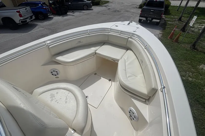 Slide: The Image of 2022 Cobia 237 Center Console boat with spacious seating and sleek design. - 9