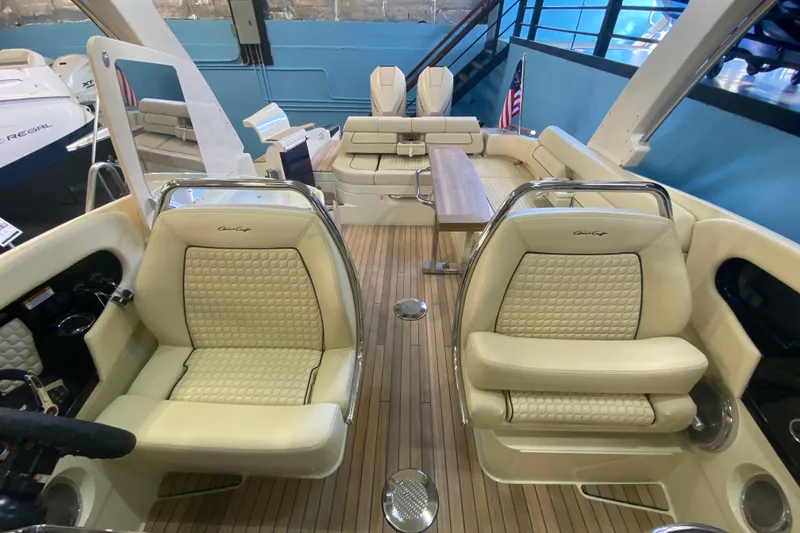 Slide: The Image of Luxurious interior of 2026 Chris-Craft Launch 31 GT with elegant seating and wooden flooring. - 18