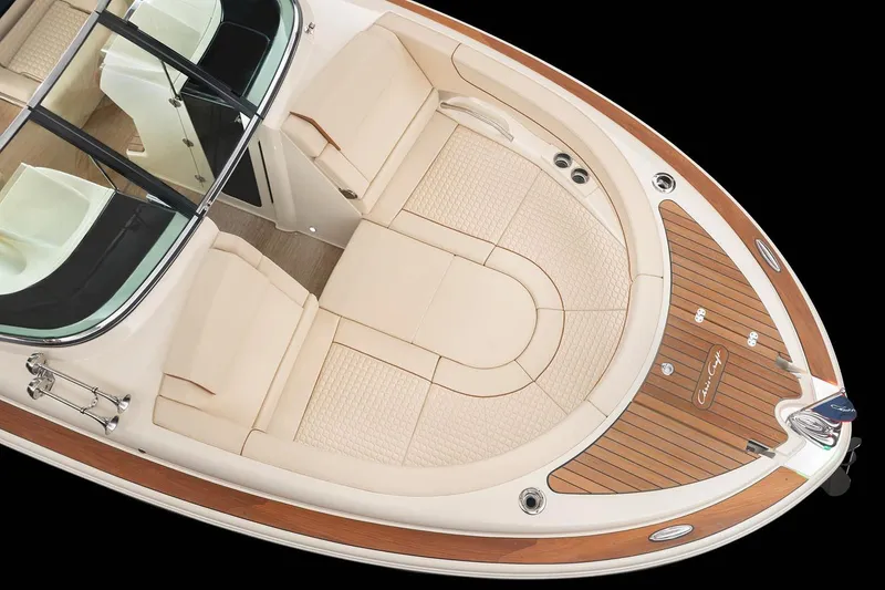 Slide: The Image of 2026 Chris-Craft Launch 31 GT interior with luxurious seating and elegant dashboard design. - 9