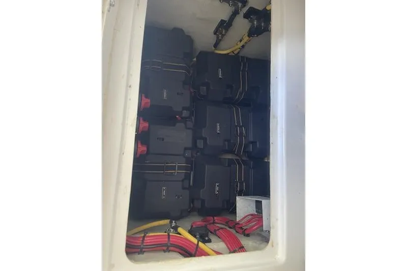 Slide: The Image of Battery compartment of 2022 SeaVee 370z boat with organized wiring. - 31