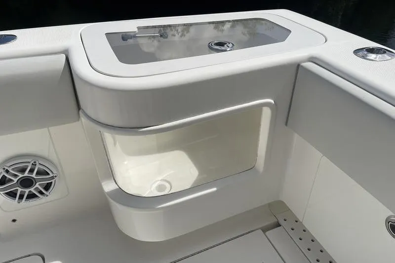 Slide: The Image of 2022 SeaVee 370z boat interior with storage compartment and speaker. - 4