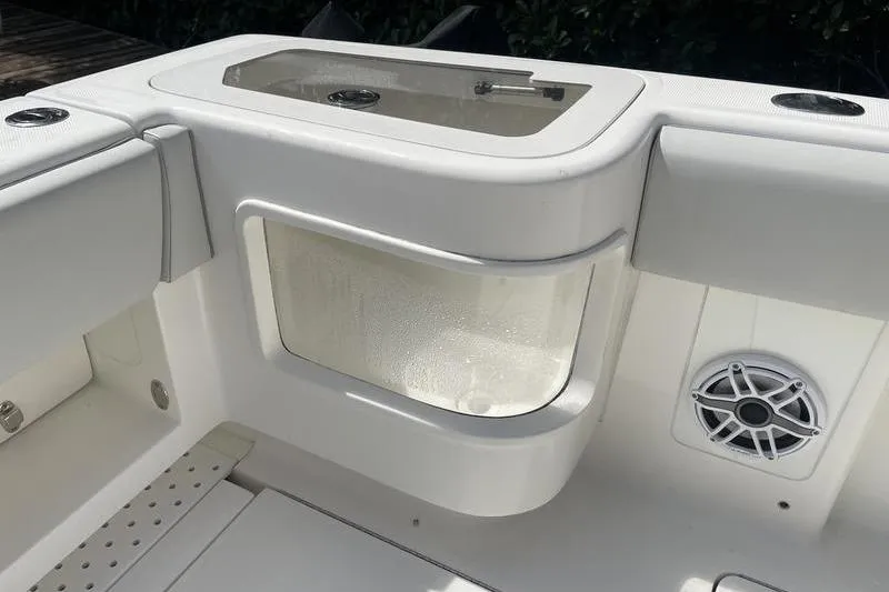 Slide: The Image of 2022 SeaVee 370z boat interior with storage compartment and speaker. - 5
