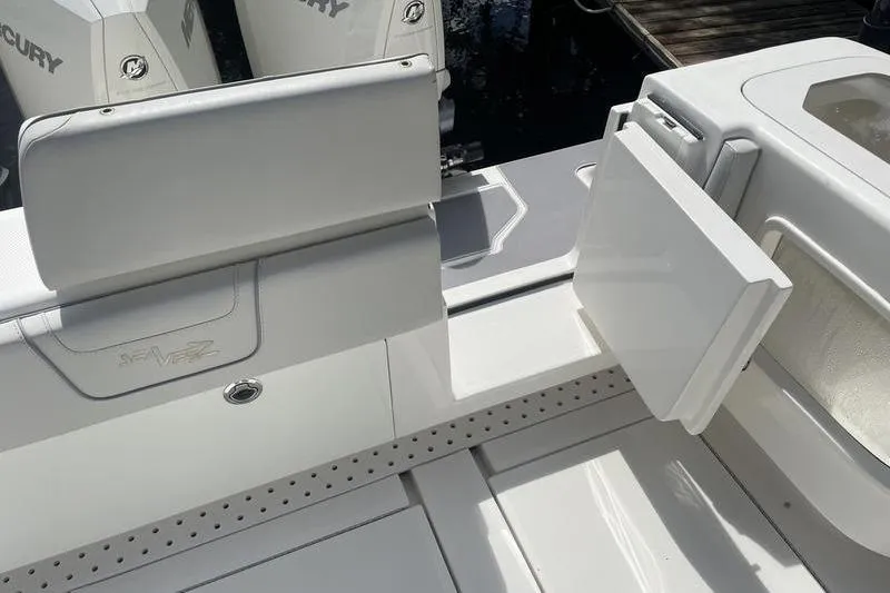 Slide: The Image of 2022 SeaVee 370z boat deck with Mercury engines and seating area. - 6