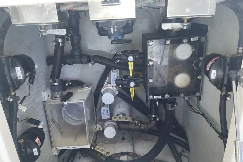 Slide: The Image of Engine compartment of a 2022 SeaVee 370z boat, showcasing various mechanical components. - 8