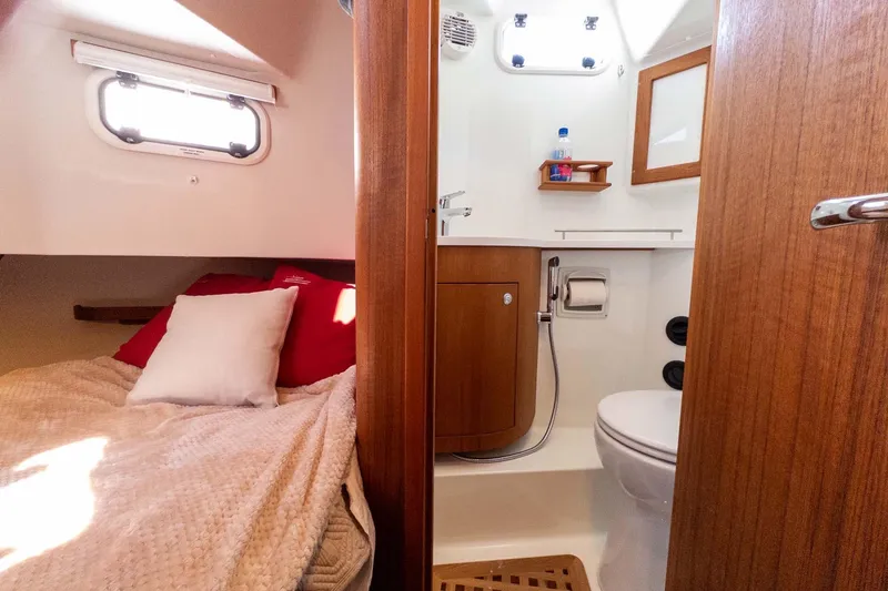 Slide: The Image of 2024 Targa 37 yacht interior with cozy cabin and modern bathroom. - 41