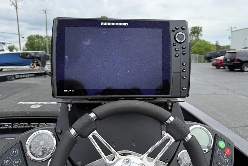 Slide: The Image of 2015 Ranger Z520 Comanche boat dashboard with Humminbird Helix 12 fishfinder display. - 11