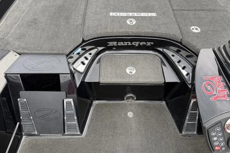 Slide: The Image of 2015 Ranger Z520 Comanche boat deck with Kistler branding and storage compartments. - 12