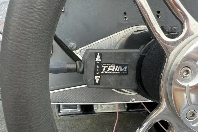 Slide: The Image of Steering wheel with Pro Trim control on 2015 Ranger Z520 Comanche boat. - 17