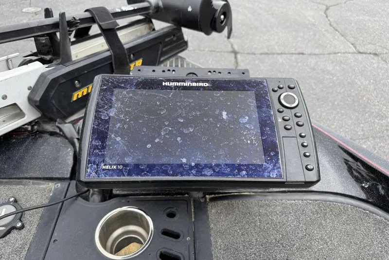 Slide: The Image of Humminbird Helix 10 fish finder on 2015 Ranger Z520 Comanche boat dashboard. - 2