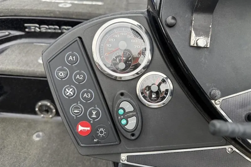Slide: The Image of Control panel of 2015 Ranger Z520 Comanche boat with gauges and buttons. - 22
