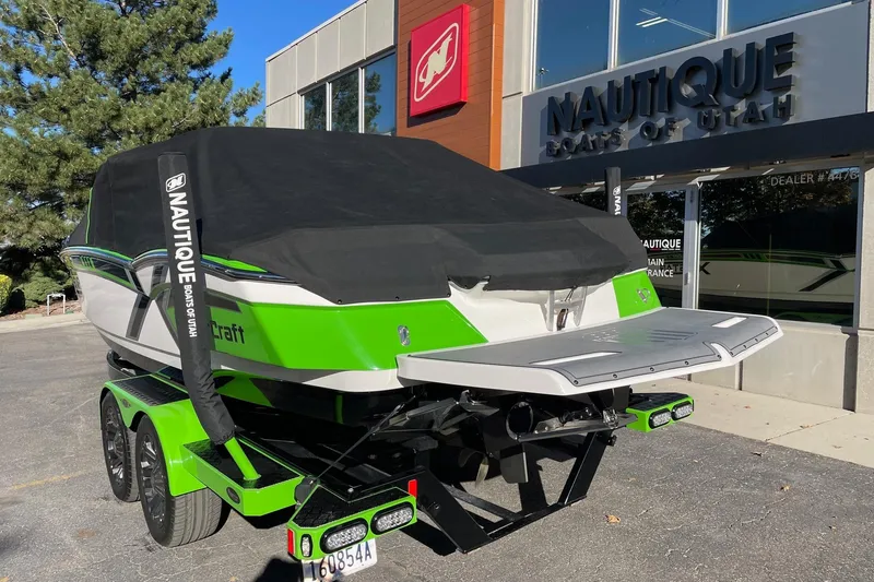 Slide: The Image of 2013 MasterCraft XStar boat with cover at Nautique dealership in Utah. - 17