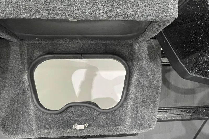 Slide: The Image of Carpeted storage compartment in 2026 Skeeter WXR2060 F boat. - 13