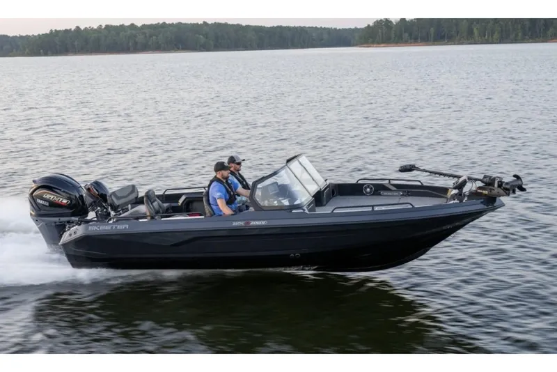 Slide: The Image of Manufacturer Provided Image: 2026 Skeeter WXR2060 F boat cruising on a lake with two passengers. - 27