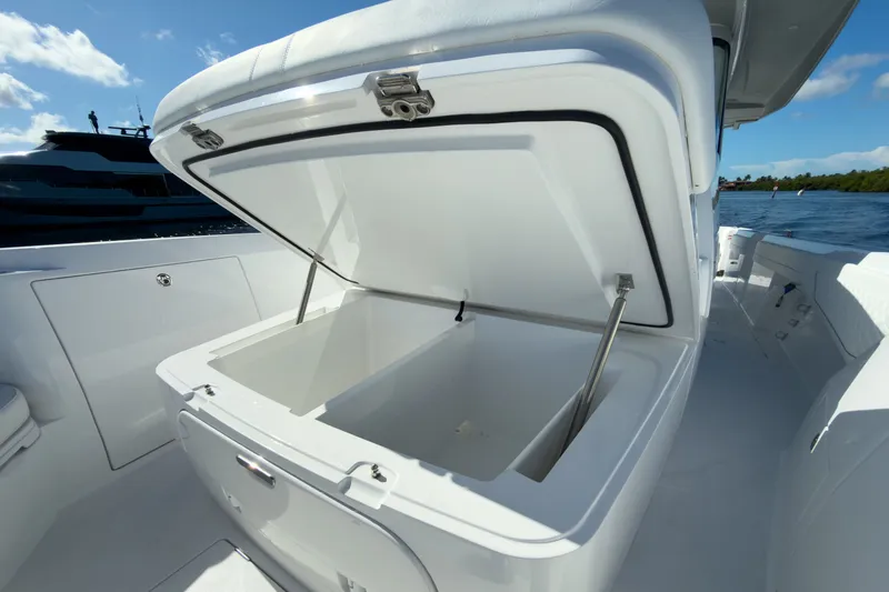 Slide: The Image of Intrepid 43 Nomad SE 2026 with open storage compartment on deck. - 17