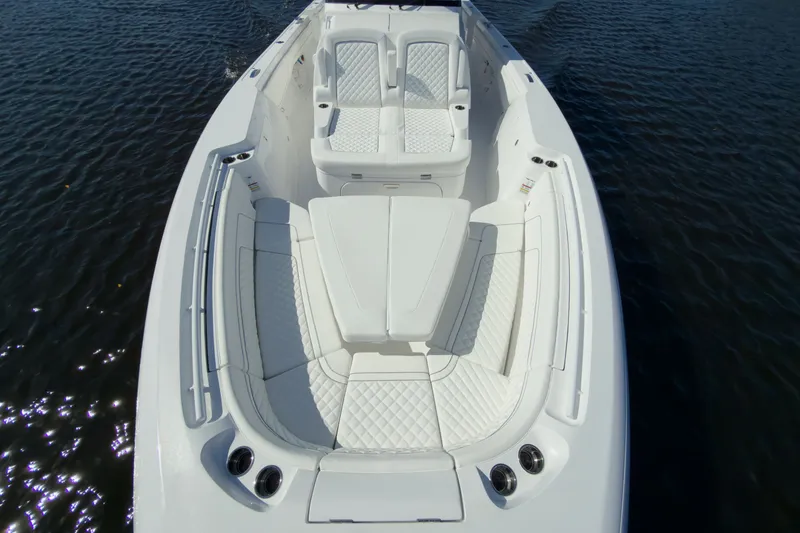 Slide: The Image of Intrepid 43 Nomad SE 2026 with luxurious white interior on water. - 19