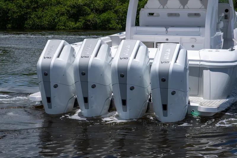 Slide: The Image of Intrepid 43 Nomad SE 2026 with four outboard engines. - 4