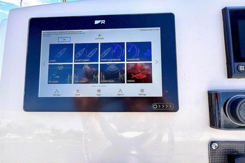 Slide: The Image of Touchscreen display on 2022 Boston Whaler 220 Dauntless boat, showing navigation options. - 3