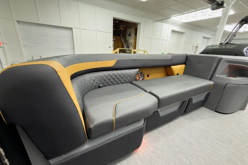 Slide: The Image of Luxurious interior of 2026 Godfrey Sweetwater 22' Split Bench Tritoon, featuring sleek seating design. - 12