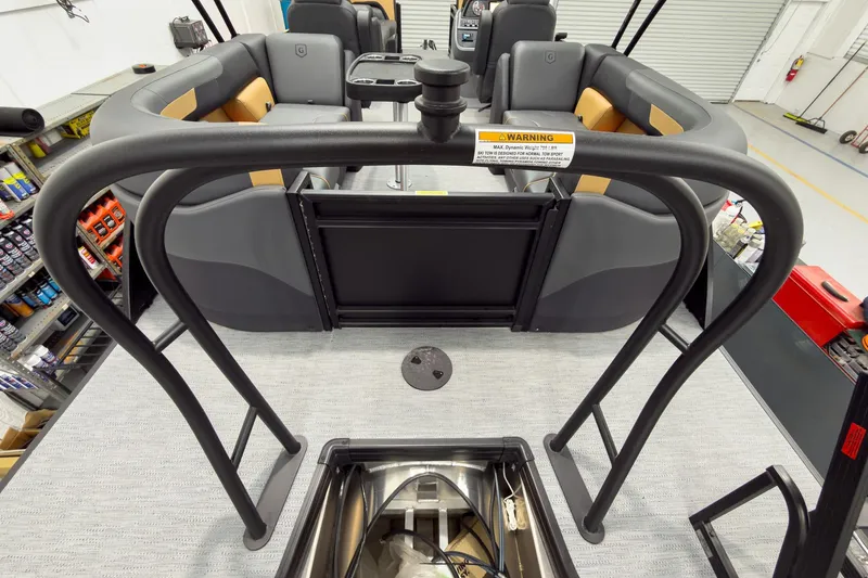 Slide: The Image of 2026 Godfrey Sweetwater 22' Split Bench Tritoon interior with seating and storage view. - 28