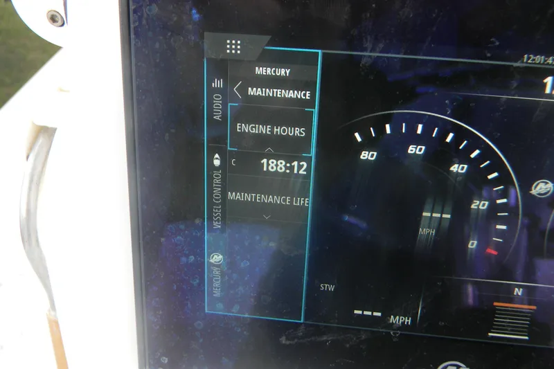 Slide: The Image of Close-up of a 2013 Yellowfin 24 Bay boat's dashboard showing 188 engine hours. - 13