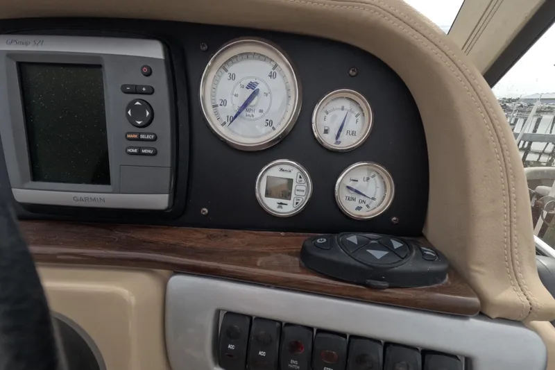 Slide: The Image of Dashboard of 2012 Four Winns V265 boat with Garmin GPS and gauges. - 36