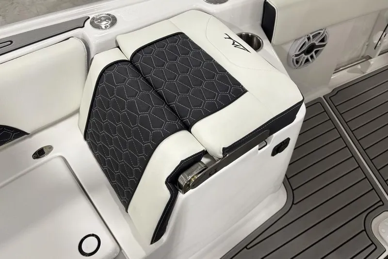Slide: The Image of 2025 Tidewater 3100 Carolina Bay boat seat with black and white upholstery, hexagonal stitching. - 12