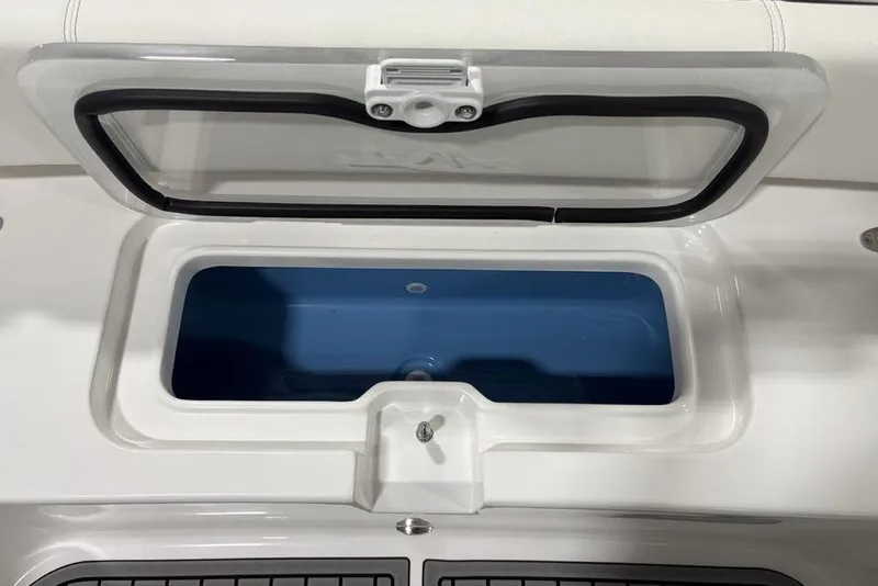 Slide: The Image of Open storage compartment on 2025 Tidewater 3100 Carolina Bay boat. - 13