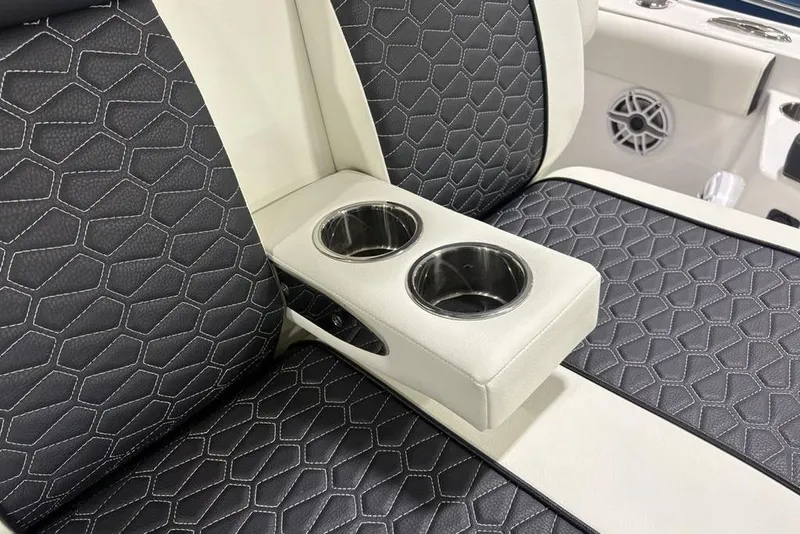 Slide: The Image of Luxurious seating with cup holders on 2025 Tidewater 3100 Carolina Bay boat. - 14