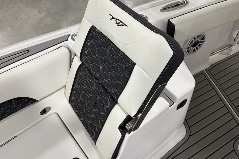 Slide: The Image of 2025 Tidewater 3100 Carolina Bay boat seat with stylish black and white upholstery. - 16