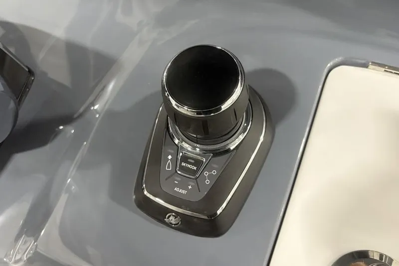 Slide: The Image of Joystick control on 2025 Tidewater 3100 Carolina Bay boat dashboard. - 29